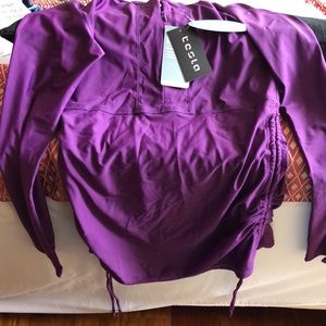 NWT Tesla rashguard plum